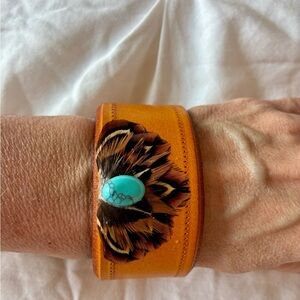 Handcrafted Leather Cuff Bracelet with Turquoise Stone and Feather Design